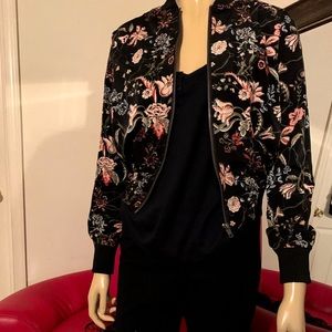 Juniors floral zip up.